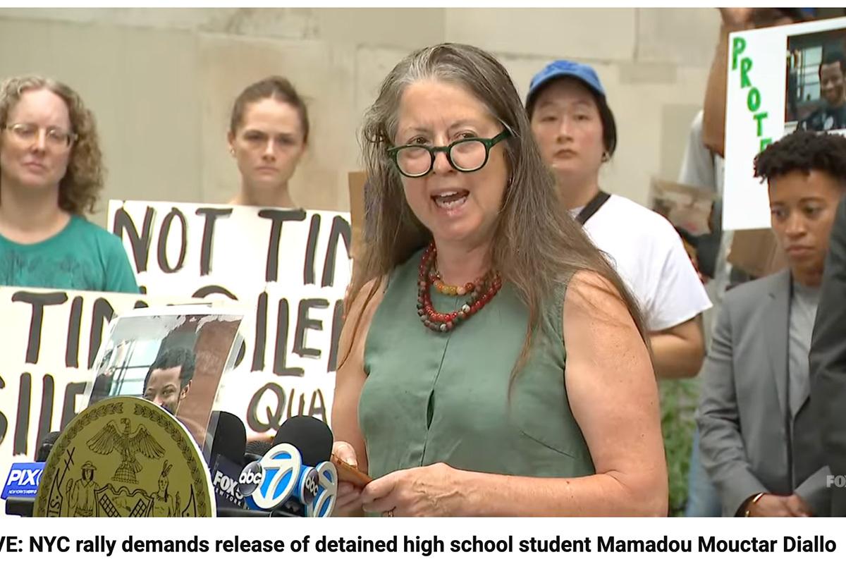 A screen shot of a video of the Aug. 14, 2025 rally and press conference protesting Mamadou "Mouctar" Diallo's detention by ICE. Katherine Alford of Morningside Meeting is speaking.