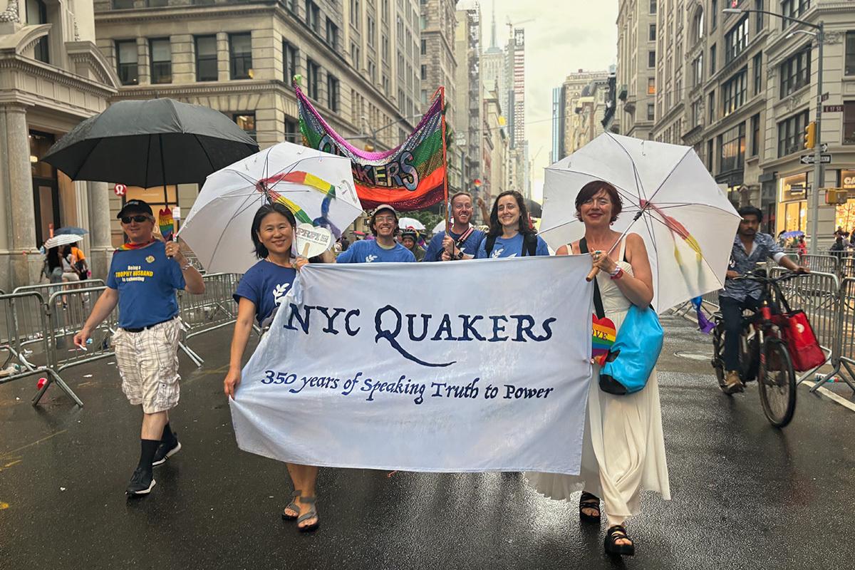 NYC Quakers marching rainy Pride 2024 1200 800